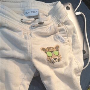 Kids Cream Joggers with Cool Leopard Design